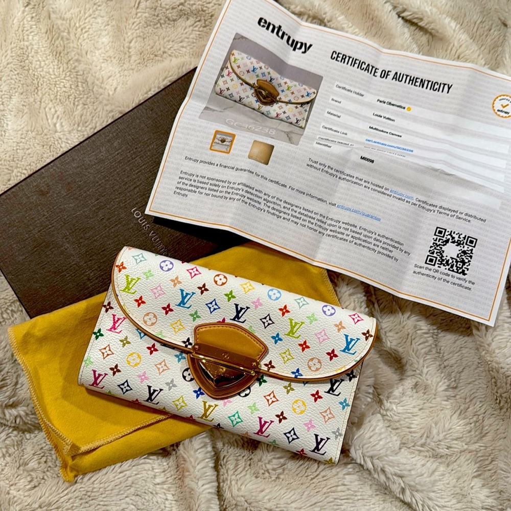 LOUIS VUITTON 
White Multicolor Eugenie Wallet